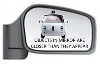 autonomous vehicle in mirror
